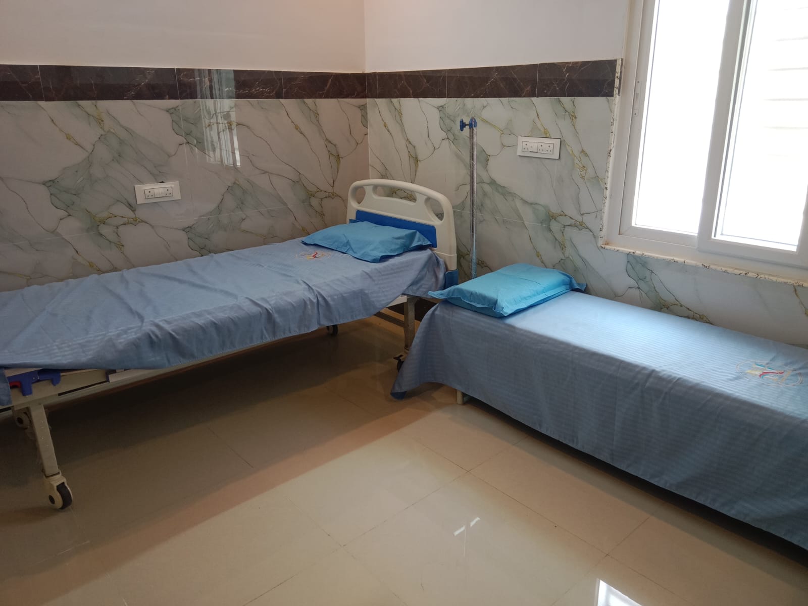 Inpatient room at Dr. Naidu Hospital Yeleswaram