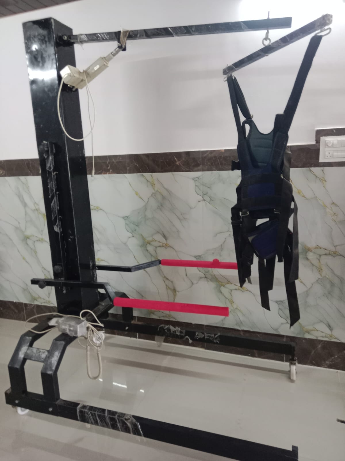 Suspension therapy rehabilitation equipment at Dr. Naidu Hospital